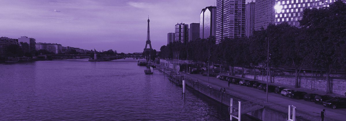 The Eiffel Tower above the Seine in Paris
